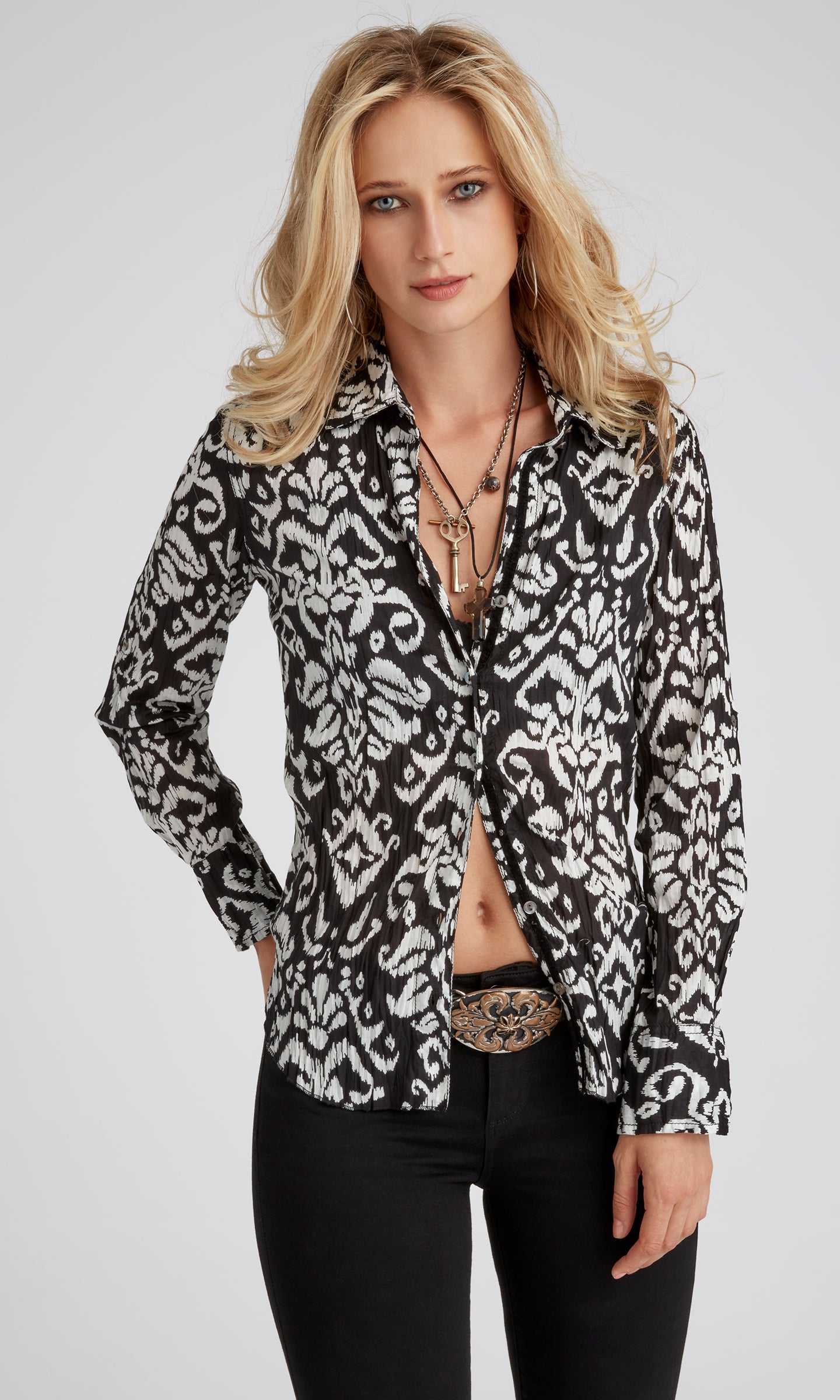 A model wears a CINO Indochine Black/White button-down Shirt