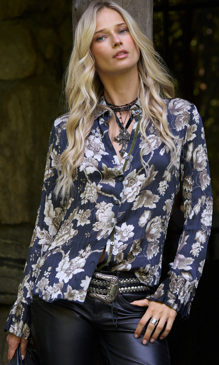 A model wears a CINO  Antique Floral button-down Shirt